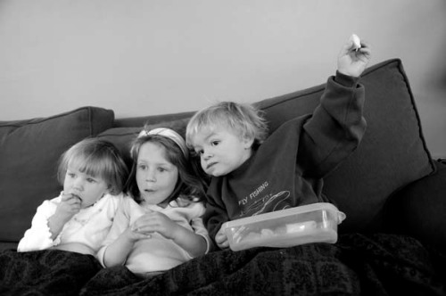 Theo and his buddies Bella, center, and her sister Sophie watch a movie on their couch.  We are so thankful to have John and Gretchen in Denver with us!